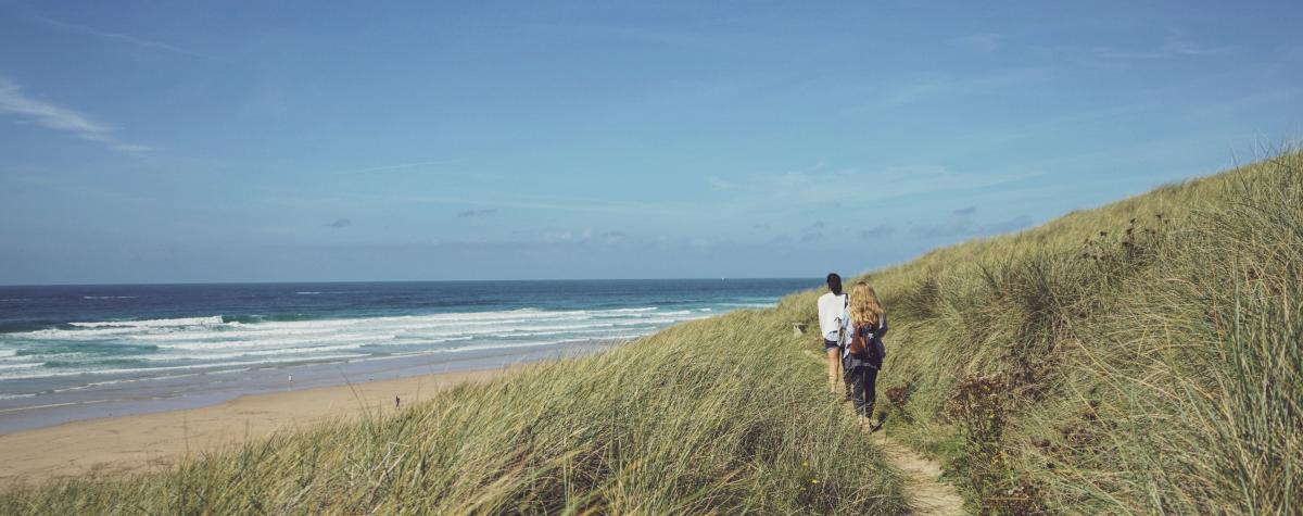 People walking along the coastal path near Perranporth